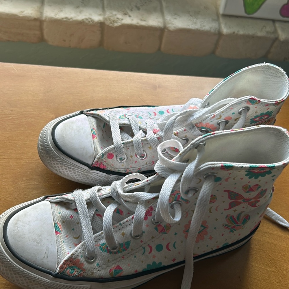 Converse all stars high top.  Girls size 3.5.  In excellent, used condition.